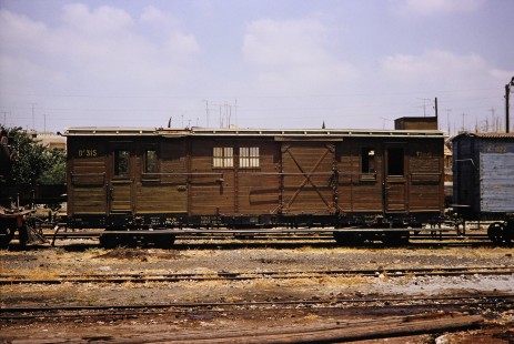 Syrian Railways cars no. D-315 and K-1122 in Daraa, Daraa, Syria on July 19, 1991. Photograph by Fred M. Springer, © 2014, Center for Railroad Photography and Art. Springer-Hedjaz-ZimZam(1)-08-37