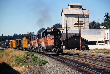 Southbound Milwaukee Road freight train at Winlock, Washington, on July 20, 1979. Photograph by John F. Bjorklund, © 2016, Center for Railroad Photography and Art. Bjorklund-68-17-08
