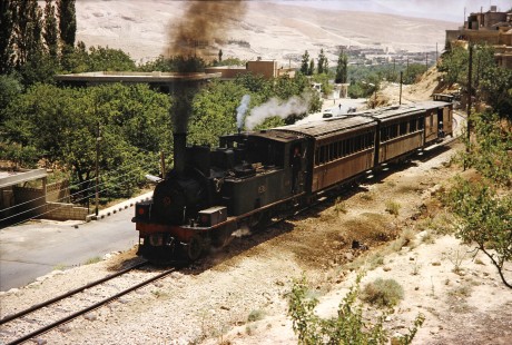 Syrian Railways 2-6-0 steam locomotive no. 130-751 in Damascus, Syria on July 20, 1991. Photograph by Fred M. Springer, © 2014, Center for Railroad Photography and Art. Springer-Hedjaz-ZimZam(1)-09-04