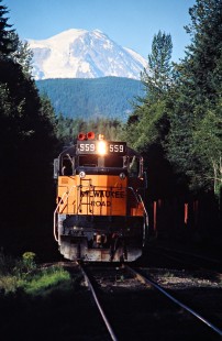 Southbound Milwaukee Road freight train and Mt. Rainier at Mineral, Washington, on August 7, 1978. Photograph by John F. Bjorklund, © 2016, Center for Railroad Photography and Art. Bjorklund-67-03-15