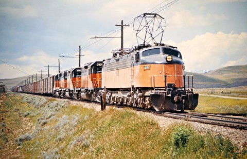 Eastbound Milwaukee Road freight train in Loweth, Montana, on July 23, 1973. Photograph by John F. Bjorklund, © 2016, Center for Railroad Photography and Art. Bjorklund-64-07-13