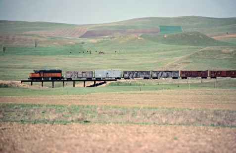 Westbound Milwaukee Road local work train in Raleigh, North Dakota, on May 15, 1978. Photograph by John F. Bjorklund, © 2016, Center for Railroad Photography and Art. Bjorklund-66-15-14