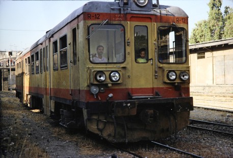 Syrian Railways railcar no. R-12 and its engineer in Damascus, Syria on July 20, 1991. Photograph by Fred M. Springer, © 2014, Center for Railroad Photography and Art. Springer-Hedjaz-ZimZam(1)-09-31
