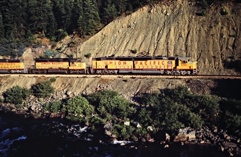 Union Pacific freight train led by DDA40X "Centennial" locomotive no. 6945 on the Western Pacific Railroad near Belden, California, on June 17, 1984. Photograph by John F. Bjorklund, © 2016, Center for Railroad Photography and Art. Bjorklund-93-11-03