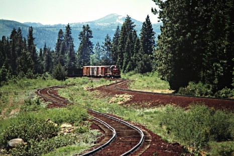 Eastbound McCloud River Railroad freight train near McCloud, California, on June 22, 1984. Photograph by John F. Bjorklund, © 2016, Center for Railroad Photography and Art. Bjorklund-93-14-18