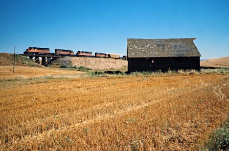 Westbound Milwaukee Road freight train at Seabury, Washington, on August 10, 1978. Photograph by John F. Bjorklund, © 2016, Center for Railroad Photography and Art. Bjorklund-67-10-18