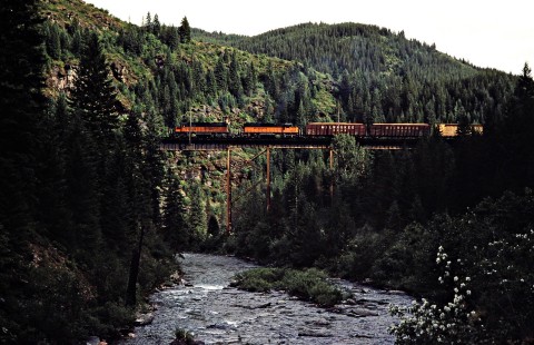 Eastbound Milwaukee Road freight train crossing bridge in Kyle, Idaho, on July 11, 1979. Photograph by John F. Bjorklund, © 2016, Center for Railroad Photography and Art. Bjorklund-68-02-13