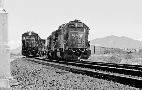 Westbound Southern Pacific Railroad freight trains pass on Sybil siding, east of Benson, Arizona, in August 1990. Photograph by J. Parker Lamb, © 2017, Center for Railroad Photography and Art. Lamb-02-124-15