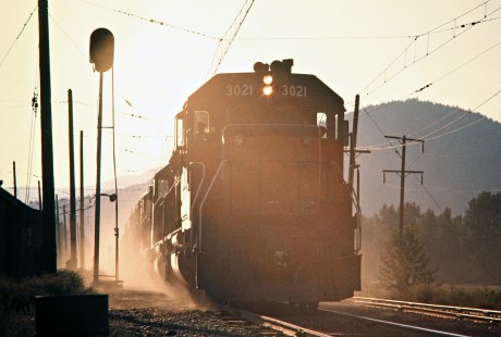 Eastbound Milwaukee Road freight train at Haugan, Montana, on July 17, 1973. Photograph by John F. Bjorklund, © 2016, Center for Railroad Photography and Art. Bjorklund-64-01-01