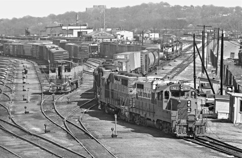 Illinois Central Gulf Railroad freight for Jackson, Tennessee, pulls out of Thomas Yard in Birmingham, Alabama, as Frisco units await clearance in June 1976. Photograph by J. Parker Lamb, © 2017, Center for Railroad Photography and Art. Lamb-02-120-04