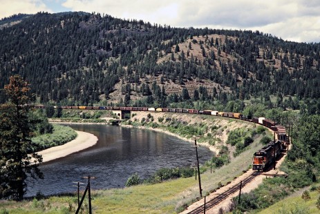 Eastbound Milwaukee Road freight train in Huson, Montana, on July 10, 1979. Photograph by John F. Bjorklund, © 2016, Center for Railroad Photography and Art. Bjorklund-67-27-15