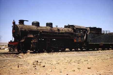 Syrian Railways 2-8-2 steam locomotive no. 263 close-up in Daraa, Daraa, Syria on July 21, 1991. Photograph by Fred M. Springer, © 2014, Center for Railroad Photography and Art. Springer-Hedjaz-ZimZam(1)-11-41