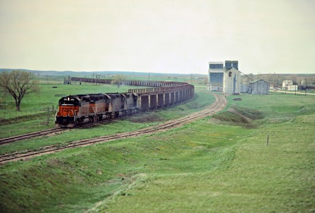 Eastbound Milwaukee Road train carrying welded rail in Keldron, South Dakota, on May 14, 1978. Photograph by John F. Bjorklund, © 2016, Center for Railroad Photography and Art. Bjorklund-66-11-14