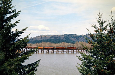 Eastbound Milwaukee Road freight train crossing Benewah Lake, Idaho, on April 30, 1975. Photograph by John F. Bjorklund, © 2016, Center for Railroad Photography and Art. Bjorklund-64-22-05