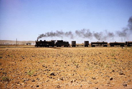 Syrian Railways steam locomotive in Al-Zabadani, Syria on July 21, 1991. Photograph by Fred M. Springer, © 2014, Center for Railroad Photography and Art. Springer-Hedjaz-ZimZam(1)-10-02