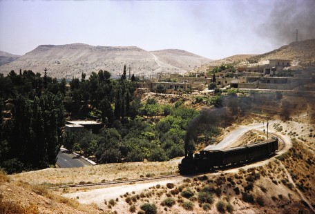 Syrian Railways 2-6-0 steam locomotive no. 130-751 in Damascus, Syria on July 20, 1991. Photograph by Fred M. Springer, © 2014, Center for Railroad Photography and Art. Springer-Hedjaz-ZimZam(1)-09-07