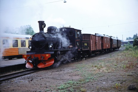 Norsholm–Västervik–Hultsfreds Järnvägar steam locomotive no. 22 moves along the tracks to Kalmar, Sweden on June 3, 1989.
Photograph by Fred M. Springer, © 2014, Center for Railroad Photography and Art. Springer-Scan-Swiss-York-05-41