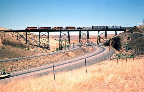 Westbound Milwaukee Road freight train crossing I-90 at Boylston, Washington, on July 13, 1979. Photograph by John F. Bjorklund, © 2016, Center for Railroad Photography and Art. Bjorklund-68-07-02