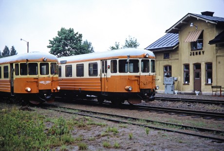 NVHJ diesel railcars no. 888 and no. 893 carry passengers past Jenny Station in Verkeback, on the way to Kalmar, Sweden, on June 3, 1989. Photograph by Fred M. Springer, © 2014, Center for Railroad Photography and Art. Springer-Scan-Swiss-York-05-35
