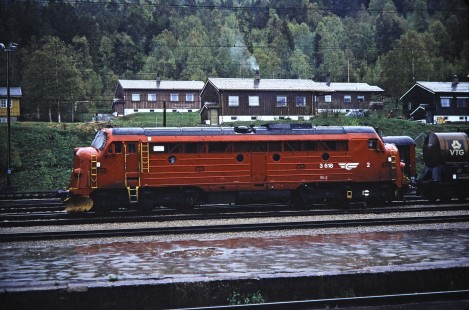Norwegian State Railways diesel locomotive no. 3618 moves down the track in Dombås, Oppland, Norway, on June 8, 1989. This photograph is taken as the photographer travels the areas of Nordland and Sør-Trøndelag, Norway. Photograph by Fred M. Springer, © 2014, Center for Railroad Photography and Art. Springer-Scan-Swiss-York-08-06