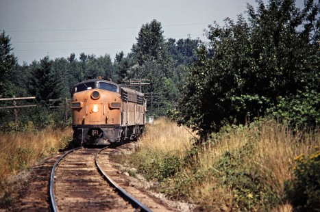 Northbound Milwaukee Road helper locomotives at Tacoma, Washington, heading to Hillsdale on July 20, 1979. Photograph by John F. Bjorklund, © 2016, Center for Railroad Photography and Art. Bjorklund-68-17-19