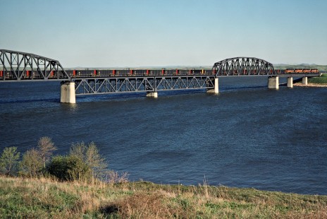 Westbound Milwaukee Road coal train crossing the Missouri River in Mobridge, South Dakota, on May 15, 1978. Photograph by John F. Bjorklund, © 2016, Center for Railroad Photography and Art. Bjorklund-66-13-18