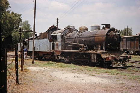 Syrian Railways steam locomotive no. 162 in Daraa, Daraa, Syria on July 19, 1991. Photograph by Fred M. Springer, © 2014, Center for Railroad Photography and Art. Springer-Hedjaz-ZimZam(1)-07-01