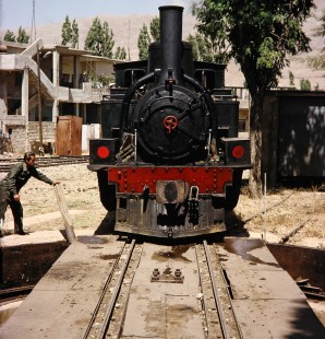 Syrian Railways steam locomotive no. 130-751 moving onto a turntable in Al-Zabadani, Syria on July 21, 1991. Photograph by Fred M. Springer, © 2014, Center for Railroad Photography and Art. Springer-Hedjaz-ZimZam(1)-10-32