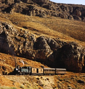 Syrian Railways steam locomotive no. 130-751 pulling three passenger cars in Al-Zabadani, Syria on July 21, 1991. Photograph by Fred M. Springer, © 2014, Center for Railroad Photography and Art. Springer-Hedjaz-ZimZam(1)-10-23