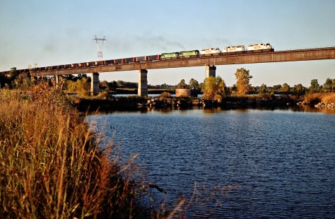 Southbound Kansas City Southern Railway coal train crossing Arkansas River in Spiro, Oklahoma, on October 21, 1988. Photograph by John F. Bjorklund, © 2016, Center for Railroad Photography and Art. Bjorklund-62-07-02