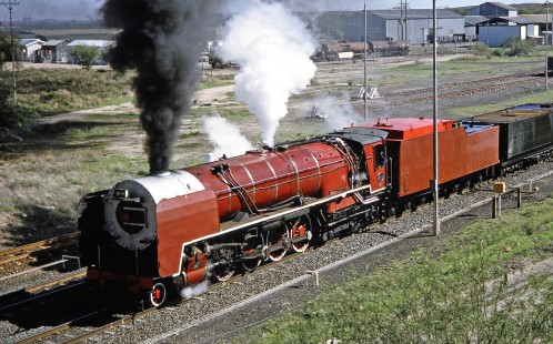 South African Railway 4-8-4 steam locomotive no. 3417 pushes forward at full steam in De Aar, Northern Cape, South Africa, on April 1, 1995. Photograph by Fred M. Springer, © 2014, Center for Railroad Photography and Art. Springer-So.Africa-NOR-SWE-04-20
