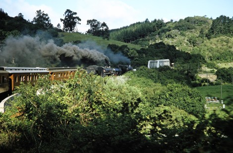 South African Railway steam locomotive moves along the Highway Bridge to Knysna, Western Cape, South Africa, on March 22, 1995. Photograph by Fred M. Springer, © 2014, Center for Railroad Photography and Art. Springer-So.Africa(1)-15-14