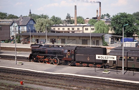 Polskie Koleje Państwowe (Polish State Railways) 2-6-2 steam locomotive no. Ol49-23 waits with its driver at the Wolsztyn train station platform in Wolsztyn, Greater Poland, Poland, on May 21, 1993. Photograph by Fred M. Springer, © 2014, Center for Railroad Photography and Art. Springer-Europe-04-29