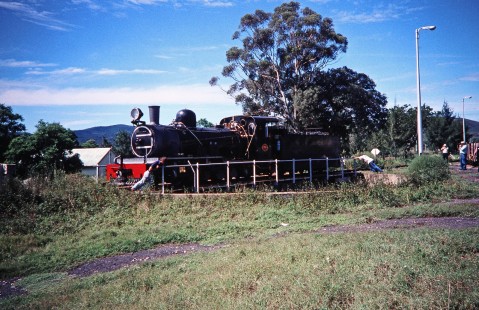 Avontuur Railway steam locomotive no. 145 is moved on a turntable by two workers in Loerie, Eastern Cape, South Africa, on March 25, 1995. Photograph by Fred M. Springer, © 2014, Center for Railroad Photography and Art. Springer-So.Africa(1)-20-35