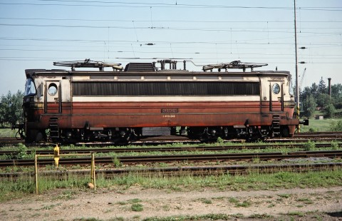 Československé Státní Dráhy or later Czech Railways electric locomotive no. 240-048-9 sits alone on the track in a part of the Czech Republic on May 30, 1993. Photograph by Fred M. Springer, © 2014, Center for Railroad Photography and Art. Springer-Europe-14-01