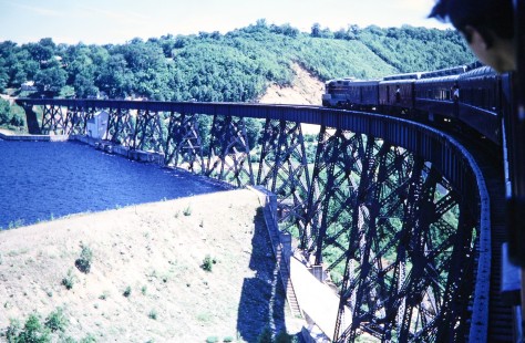 Curved steel trestle over the hydroelectric dam at Montreal Falls, Ontario, Canada, on the Algoma Central Railway as seen from the Agawa Canyon Tour Train on July 4, 1966. Photograph by Fred M. Springer, © 2014, Center for Railroad Photography and Art. Springer-East2-22-17