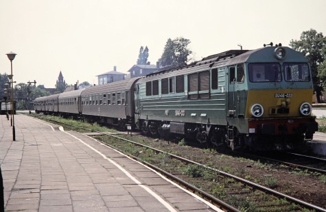 Polskie Koleje Państwowe (Polish State Railways) diesel locomotive no. SU46-033 waits outside the town station in Grodzisk, Greater Poland, Poland, on May 20, 1993. Photograph by Fred M. Springer, © 2014, Center for Railroad Photography and Art. Springer-Europe-01-07