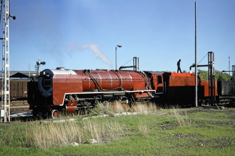 South African Railway 4-8-4 steam locomotive no. 3417 receives a water break in De Aar, Northern Cape, South Africa, on April 1, 1995. Photograph by Fred M. Springer, © 2014, Center for Railroad Photography and Art. Springer-So.Africa-NOR-SWE-04-27
