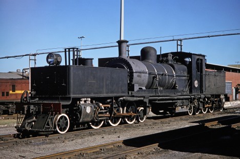 South African Railway 2-6-2+2-6-2 Garratt steam locomotive no. 2166 sits in the yard in Voorbaai, Western Cape, South Africa, on March 21, 1995. Photograph by Fred M. Springer, © 2014, Center for Railroad Photography and Art. Springer-So.Africa(1)-14-24