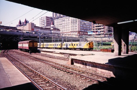 Metro electric commuter train pulls into the station at Johannesburg, Gauteng, South Africa, on March 17, 1995. Photograph by Fred M. Springer, © 2014, Center for Railroad Photography and Art. Springer-So.Africa(1)-07-34