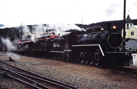White Pass and Yukon Route steam locomotive no. 73 with a passenger train at the depot in Skagway, Alaska, United States, on June 12, 1998. Photograph by Fred M. Springer, © 2014, Center for Railroad Photography and Art. Springer-Alaska-NZ-09-04