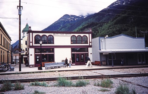 Exterior view of the White Pass Depot building and the surrounding town in Skagway, Alaska, United States on June 11, 1998. Photograph by Fred M. Springer, © 2014, Center for Railroad Photography and Art. Springer-Alaska-NZ-04-10