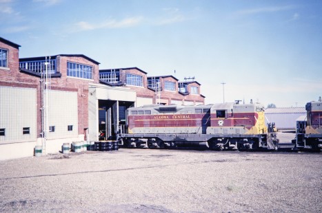 Algoma Central Railway diesel locomotive no. 167 pulls out of the engine shed in Sault St. Marie, Ontario, Canada, as part of the Agawa Canyon Tour Train, on July 4, 1966. Photograph by Fred M. Springer, © 2014, Center for Railroad Photography and Art. Springer-East2-22-13