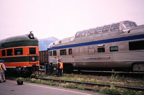 Passengers wait for the maintenance crew to finish work on two different passenger cars in Jasper, Alberta, Canada, on July 19, 2003. Photograph by Fred M. Springer, © 2014, Center for Railroad Photography and Art. Springer-Canada-NZ(1)-15-07
