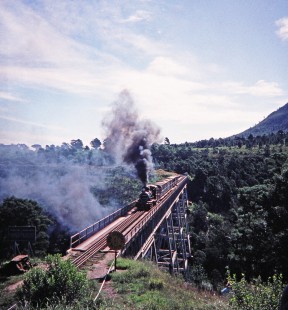 Avontuur Railway steam locomotive crosses over the Van Stadens bridge in Van Stadens, Eastern Cape, South Africa, on March 25, 1995. Photograph by Fred M. Springer, © 2014, Center for Railroad Photography and Art. Springer-So.Africa(1)-20-27