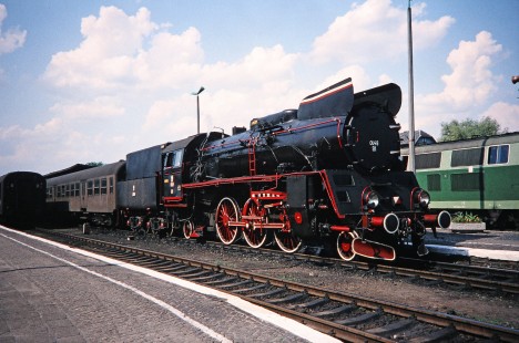 Polskie Koleje Państwowe (Polish State Railways) steam locomotive no. Ol49-81 lays in wait under a blue sky at Wolsztyn train station in Wolsztyn, Greater Poland, Poland, on May 21, 1993. Photograph by Fred M. Springer, © 2014, Center for Railroad Photography and Art. Springer-Europe-04-24