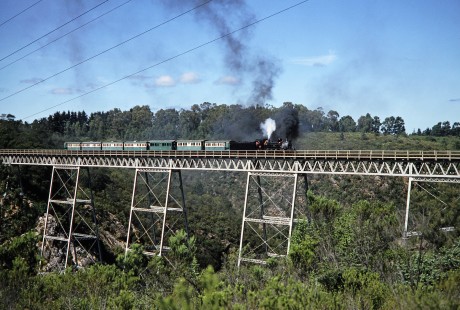 Avontuur Railway passenger train crossing the Van Stadens River Bridge in Eastern Cape, South Africa, on March 25, 1995. Photograph by Fred M. Springer, © 2014, Center for Railroad Photography and Art. Springer-So.Africa(1)-19-17