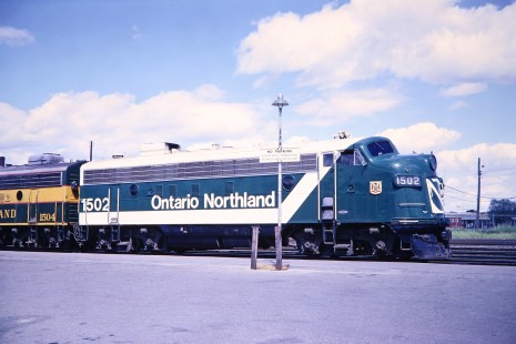 Ontario Northland Railway diesel locomotives nos. 1502 and 1504 in Timmins, Ontario, Canada, on July 8, 1966. Photograph by Fred M. Springer, © 2014, Center for Railroad Photography and Art. Springer-East2-23-23