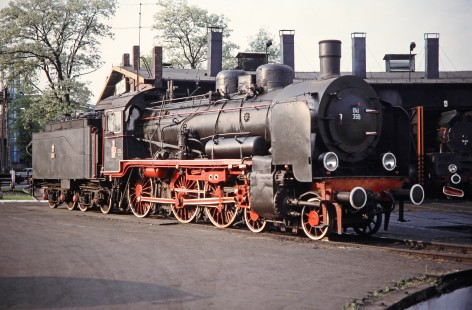 A close-up shot of Polskie Koleje Państwowe (Polish State Railways) 4-6-0 steam locomotive no. Ok1-359 leaving the Wolsztyn Roundhouse in Wolsztyn, Greater Poland, Poland, on May 20, 1993. Springer-Europe-01-21