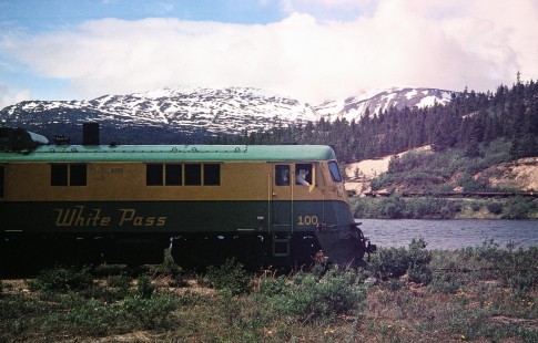 A profile shot of White Pass and Yukon Route diesel locomotive no. 100 in Bennett, British Columbia, Canada, on June 13, 1998. Photograph by Fred M. Springer, © 2014, Center for Railroad Photography and Art. Springer-Alaska-NZ-11-27
